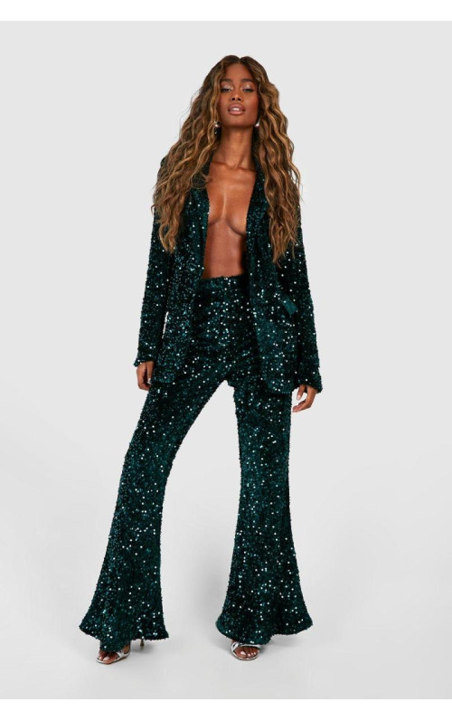 Оксамитові брюки з паєтками та кльош