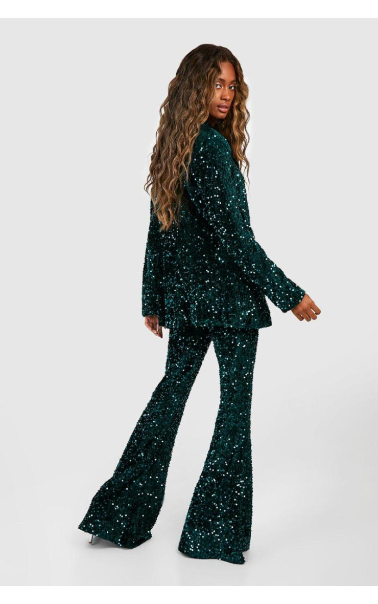 Оксамитові брюки з паєтками та кльош