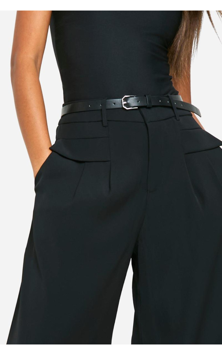 Широкі брюки з плавним поясом