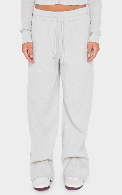Світло-сірі широкі брюки в рубчик з низькою посадкою
