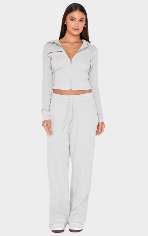 Світло-сірі широкі брюки в рубчик з низькою посадкою