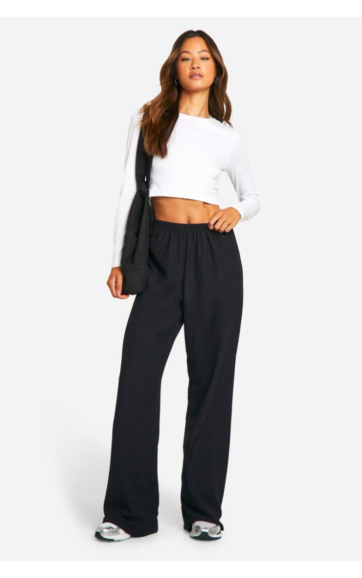 Високі широкі брюки з м'ятками