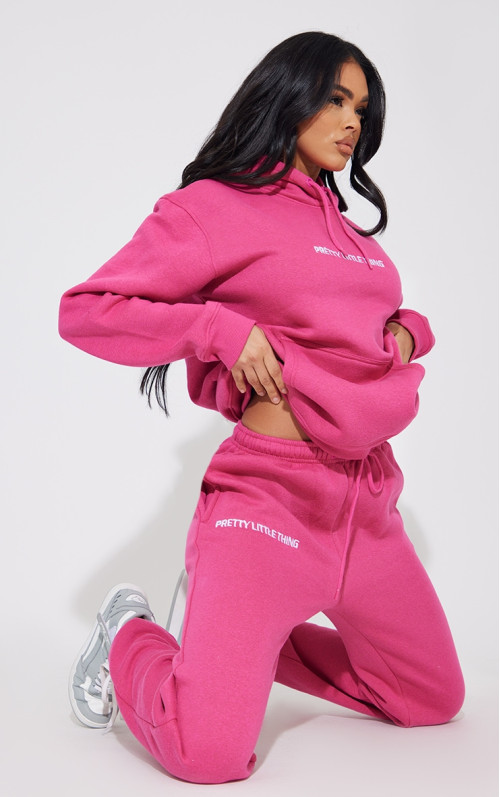 Яскраво-рожеві джоггери з вишивкою PRETTYLITTLETHING