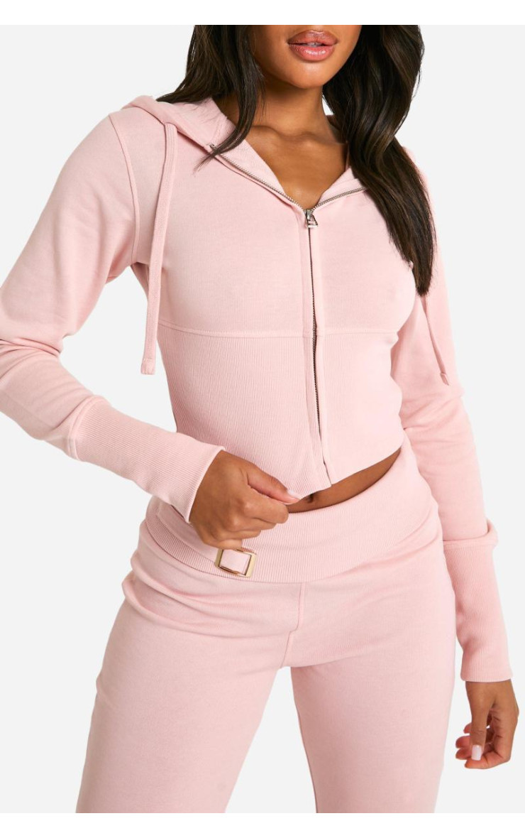 Спортивний костюм для бігунів з глибоким подолом і розкльошеними блискавками