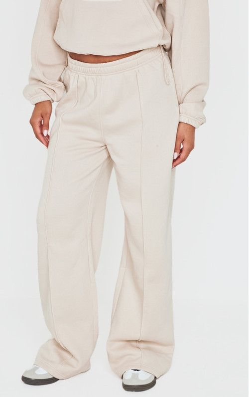 Бежевий шов деталі широкий пробіг ноги