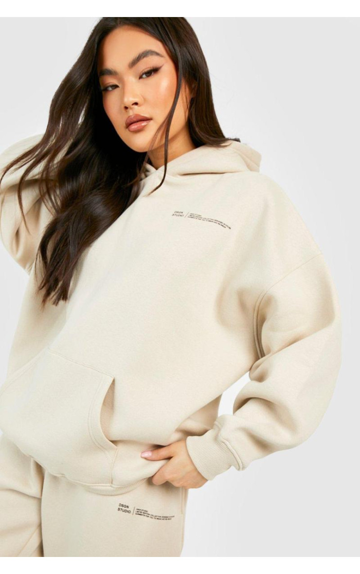 Спортивний костюм із капюшоном із текстом слогану Dsgn Studio