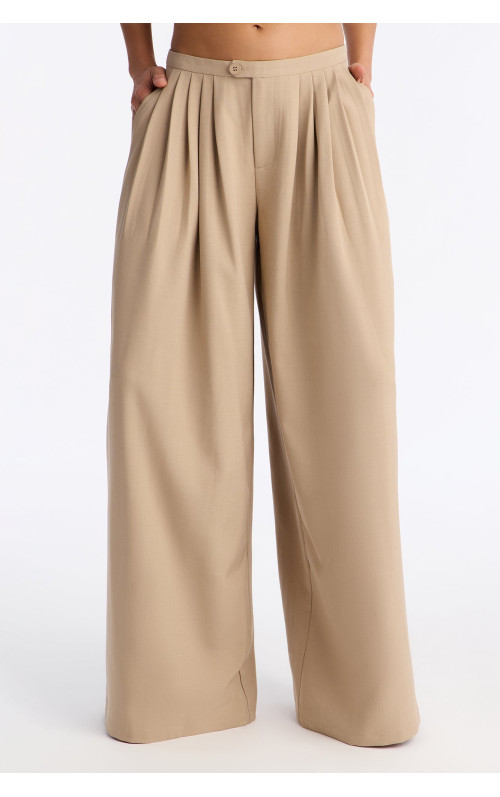 Штани Power Moves Daily з низькою посадкою та складками