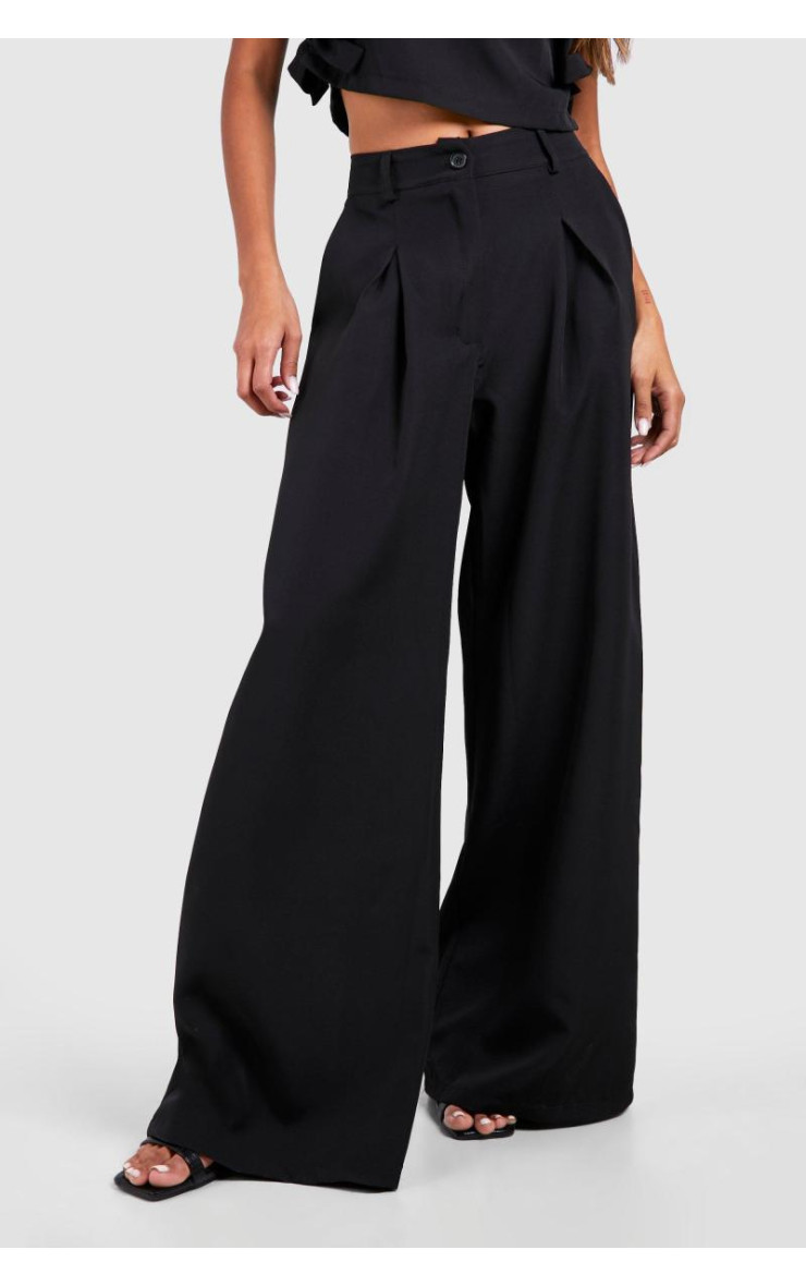 Широкі плісировані штани з високою талією